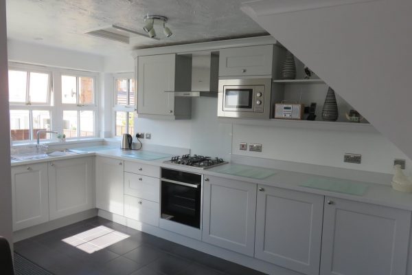Light grey beaded Shaker kitchen