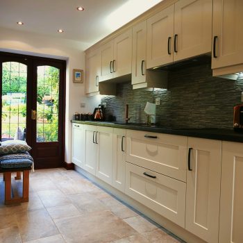 Textured worktops | Shaker kitchen, with copper accessories | The Gallery