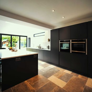 Urban kitchen by The Gallery fitted kitchens | Matte, Graphite, handle-less