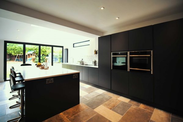 Urban kitchen by The Gallery fitted kitchens | Matte, Graphite, handle-less