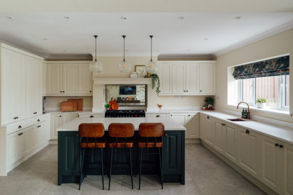 Deep forest green kitchen design in Stourton